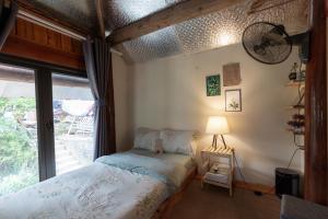 Postel nebo postele na pokoji v ubytování Moc Home Sapa