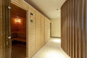 an empty hallway with a sauna in a house at Tree of Life Penthouse 3BR w Gym Pool Sauna More in Manila +29 photos
