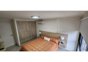 Ένα ή περισσότερα κρεβάτια σε δωμάτιο στο Miralejos Apart Triplex +56 φωτογραφίες