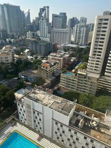 an aerial view of a city with buildings at Rent Omni Tower Apartments Nana Bangkok - Prime Sukhumvit location in Bangkok