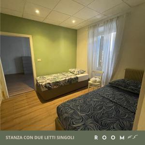 Postel nebo postele na pokoji v ubytování Room45 appartamento in centro a Gradisca