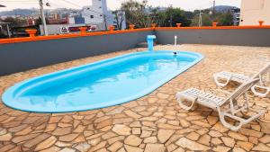 Bazén v ubytování PORTAL PARQUE HOTEL nebo v jeho okolí
