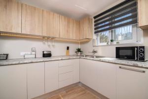 Η κουζίνα ή μικρή κουζίνα στο White Collection Villas & Suites - Pnoe Villa