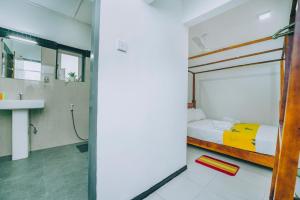 Postel nebo postele na pokoji v ubytování Shinestar Villa Mirissa