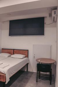 Uma cama ou camas num quarto em Best Builder