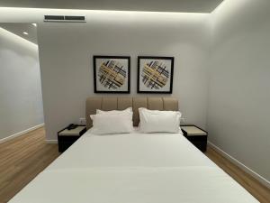 Voodi või voodid majutusasutuse Hotel Vila Zeus toas
