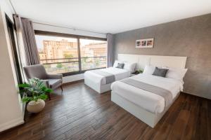 Postel nebo postele na pokoji v ubytování Nile Villa Hotel + 37 fotografií