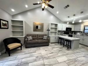 a living room with a couch and a table at Willow Ridge Cove in West Monroe