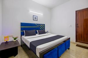Postel nebo postele na pokoji v ubytování Hotel O Relax Inn