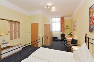 Postel nebo postele na pokoji v ubytování Hotel Haus Kleimann-Reuer