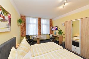 Kuchyň nebo kuchyňský kout v ubytování Hotel Haus Kleimann-Reuer