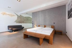 Postel nebo postele na pokoji v ubytování Guesthouse Altes Rathaus