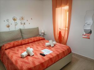 A bed or beds in a room at B&B Adele