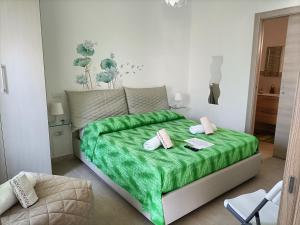 A bed or beds in a room at B&B Adele