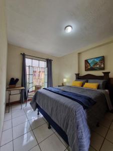 Ένα ή περισσότερα κρεβάτια σε δωμάτιο στο Mazaryk Bed and Breakfast +14 φωτογραφίες