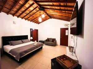TV a/nebo společenská místnost v ubytování Hotel Resort Campestre Puerta Del Sol - San Gil
