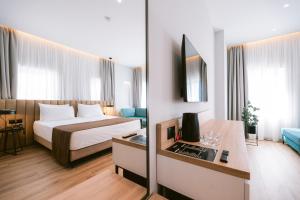 Телевізор і / або розважальний центр в TRIBUTE Hotel