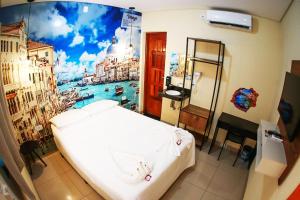 Katil atau katil-katil dalam bilik di Shelter Hostel e Pousada