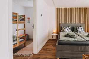 Postel nebo postele na pokoji v ubytování Chalet am Mollcesine + 10 fotografií