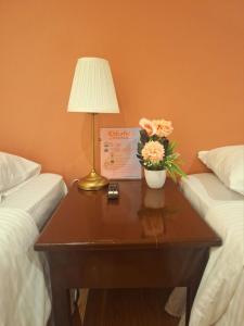 Postel nebo postele na pokoji v ubytování Irabella Travellers Inn