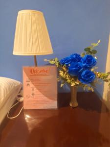 Postel nebo postele na pokoji v ubytování Irabella Travellers Inn