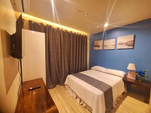 Postel nebo postele na pokoji v ubytování Irabella Travellers Inn