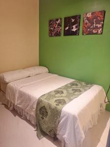 Postel nebo postele na pokoji v ubytování Irabella Travellers Inn