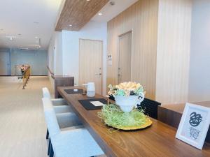a room with a table with a bowl of vegetables on it at Seaside house & Terrace SEAGULL - Vacation STAY 80513v in Towa