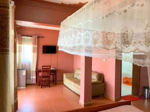 TV a/nebo společenská místnost v ubytování Hendo Hotel