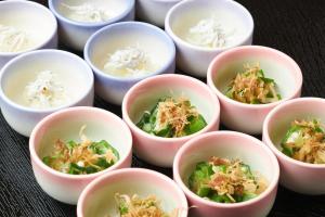 a group of small white bowls filled with food at FIVE HOTEL OSAKA - Vacation STAY 72912v in Osaka