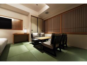 Ένα ή περισσότερα κρεβάτια σε δωμάτιο στο Prostyle Ryokan Tokyo Asakusa - Vacation STAY 48263v