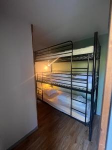 Postel nebo postele na pokoji v ubytování Pied de piste