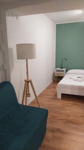 Ein Bett oder Betten in einem Zimmer der Unterkunft Guest House alla Scala