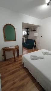 Ein Bett oder Betten in einem Zimmer der Unterkunft Guest House alla Scala