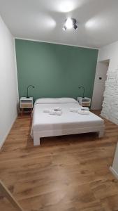 Ein Bett oder Betten in einem Zimmer der Unterkunft Guest House alla Scala