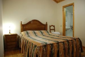 Säng eller sängar i ett rum på A TORRE no Sabugueiro