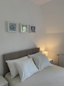 Ένα ή περισσότερα κρεβάτια σε δωμάτιο στο Apartman DivčiMonte