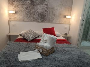 Posteľ alebo postele v izbe v ubytovaní B&B Le due costiere