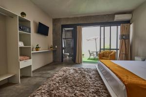 Postel nebo postele na pokoji v ubytování Aura Hotel B&B