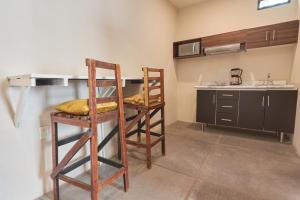 Kuchyň nebo kuchyňský kout v ubytování Aura Hotel B&B