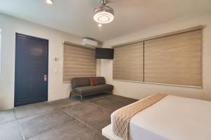 Postel nebo postele na pokoji v ubytování Aura Hotel B&B