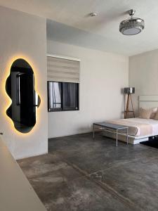 Postel nebo postele na pokoji v ubytování Aura Hotel B&B