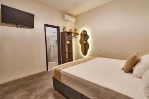 Postel nebo postele na pokoji v ubytování Aura Hotel B&B