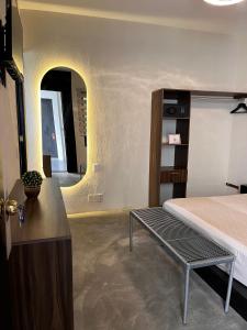 Postel nebo postele na pokoji v ubytování Aura Hotel B&B