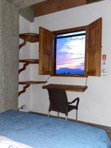 Postel nebo postele na pokoji v ubytování Hotel Santa Laura