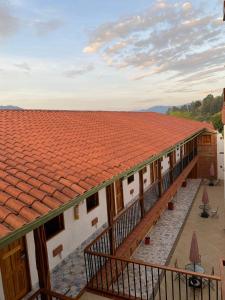 an overhead view of a building with a red roof at Hotel Santa Laura in Jericó