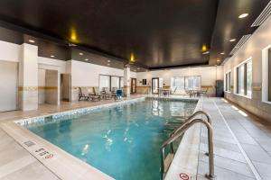 a large indoor pool with blue water in a building at Best Western Plus Cranberry-Pittsburgh North in Cranberry Township