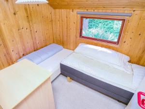 Postel nebo postele na pokoji v ubytování 5 person holiday home in Jægerspris-By Traum