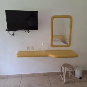 TV a/nebo společenská místnost v ubytování Hotel Anturios