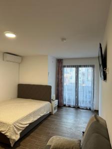 Postel nebo postele na pokoji v ubytování Apartman Milanovic